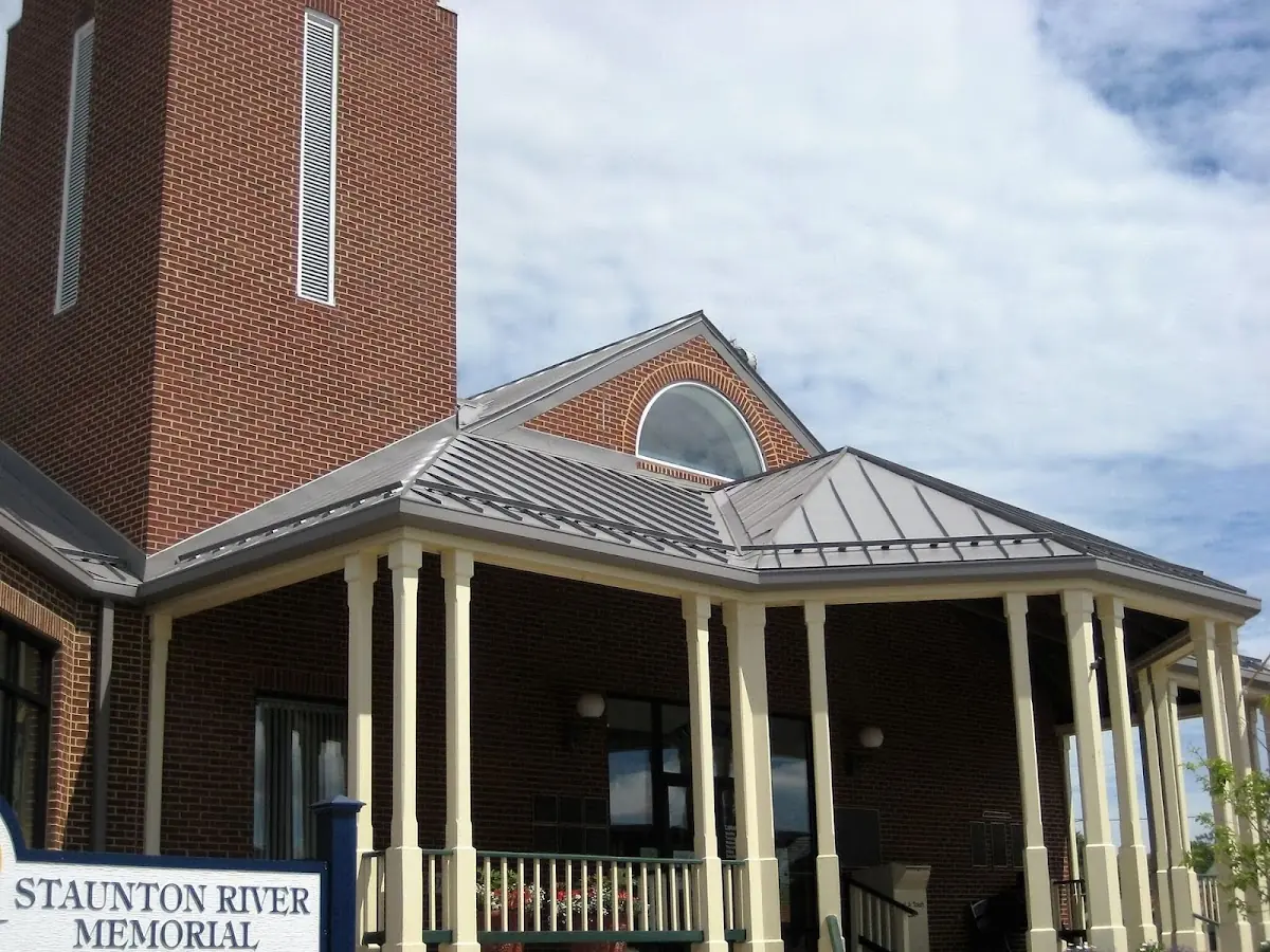 Skilled roofing craftsmen working on a residential roof in Gulf Coast